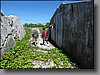 Chester and Clint walk out of a WWII bunker