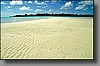 The lagoon is fairly shallow and much of its sandy bottom becomes exposed during low tide.